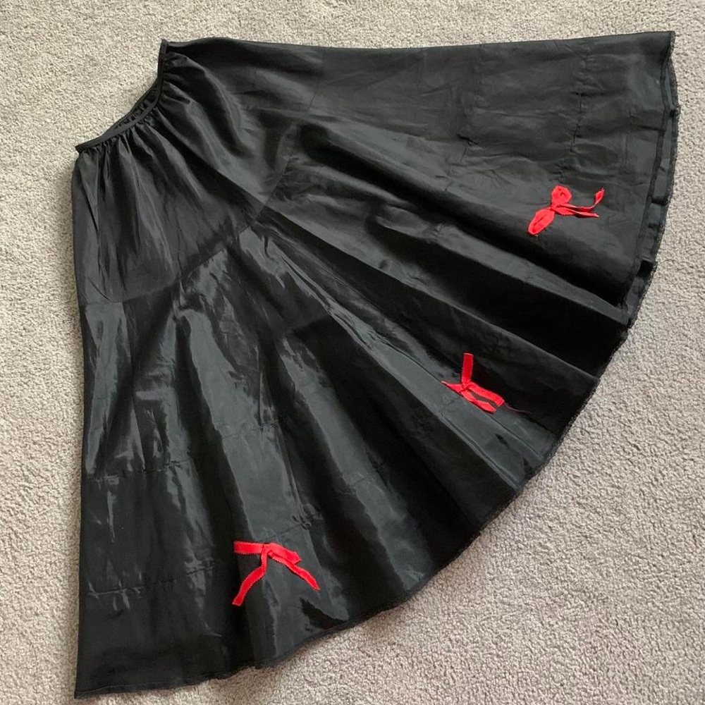 1950s crinoline skirt with adorable red ribbon bow details